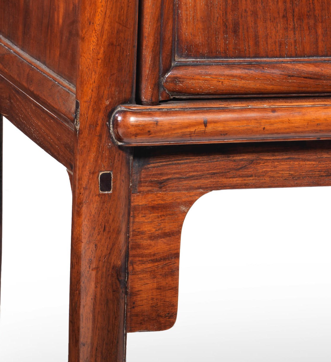 Close view of cabinet frame connection and joinery.