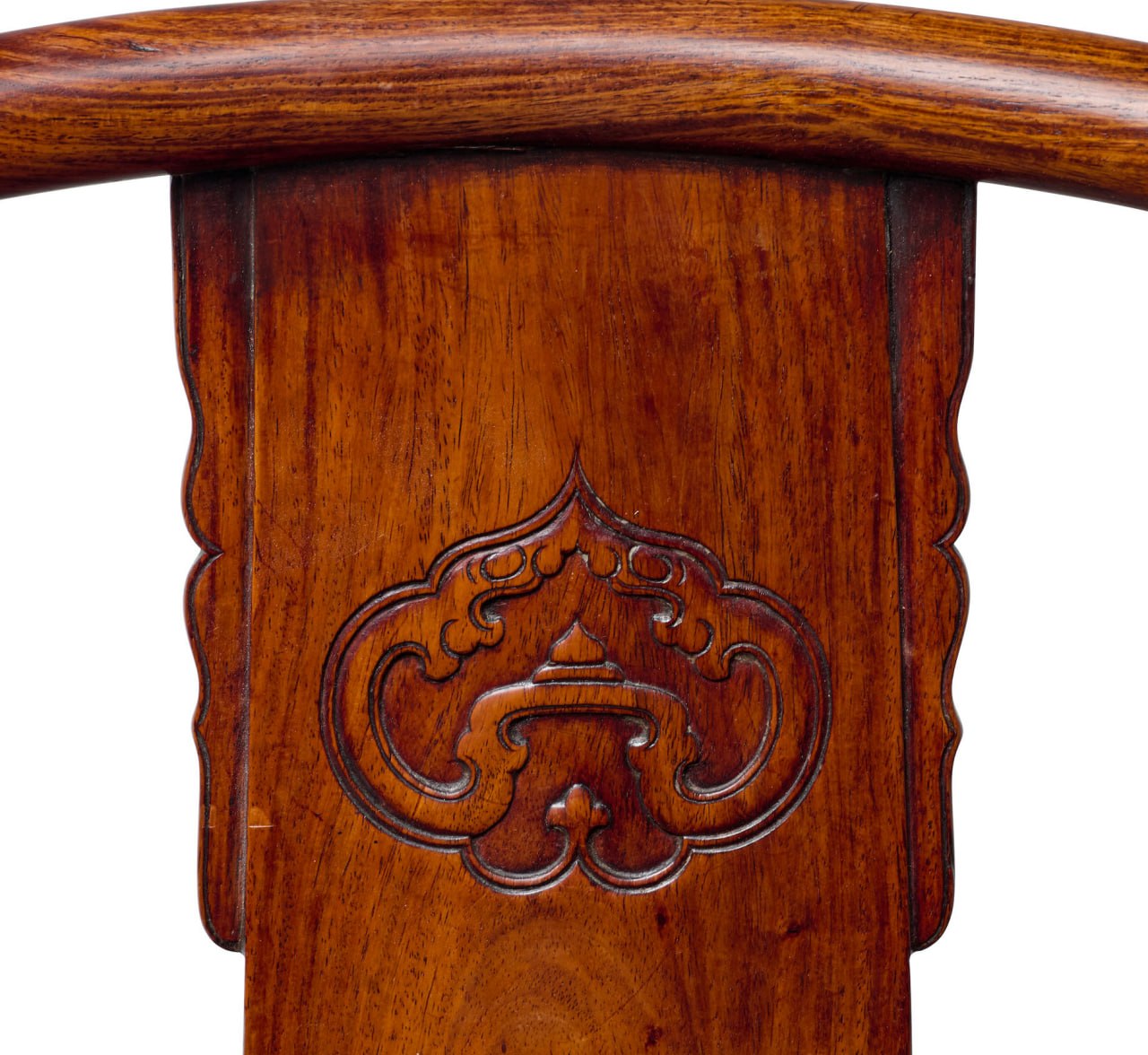 Carved chair splat detail with elegant ruyi motif.