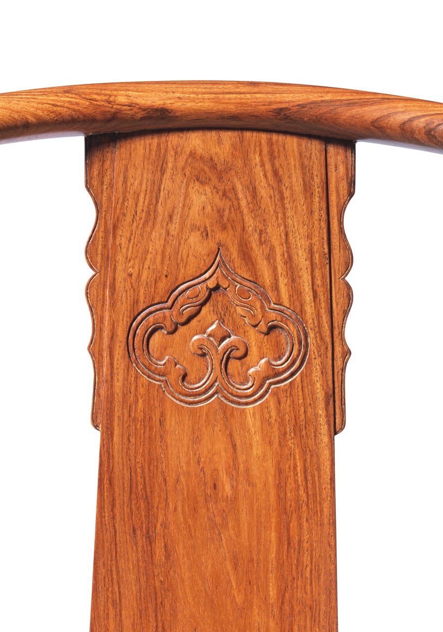 Second carved chair splat detail with huanghuali grain.