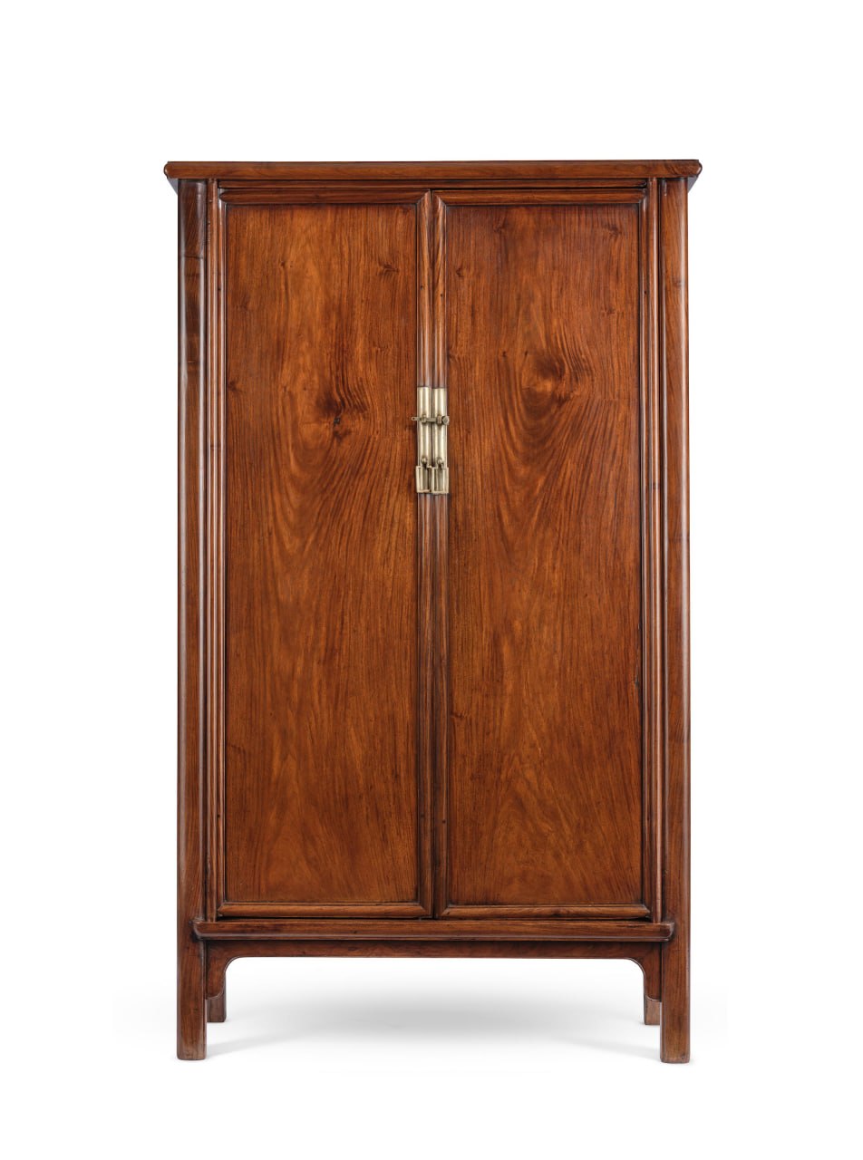 Tall huanghuali cabinet with beautifully figured continuous grain doors.